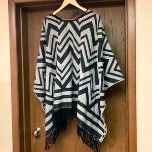 Black and white zigzag poncho with fringe